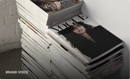 A stack of printed brochures on a press table